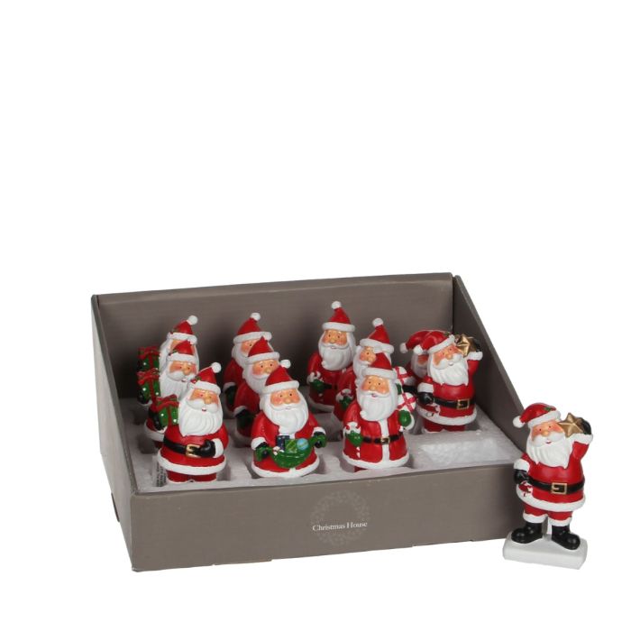 Julemand deler ud flere forskellige varianter med gaver eller slik i flotte julefarver fra Christmas House.