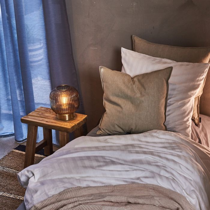 Sengesæt hvidt i soveværelsesmiljø