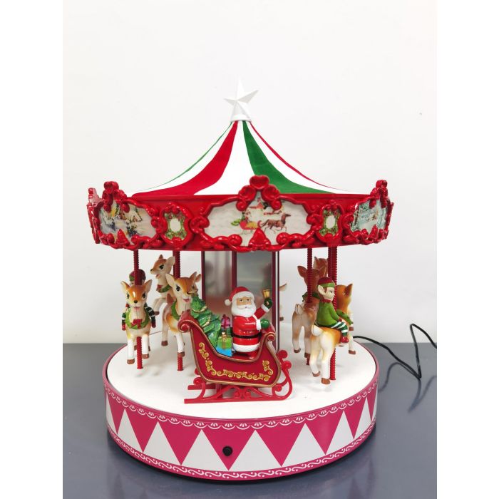 Julekarrusel med julemanden og hans dyr i julefarver med musik og bevægelse.