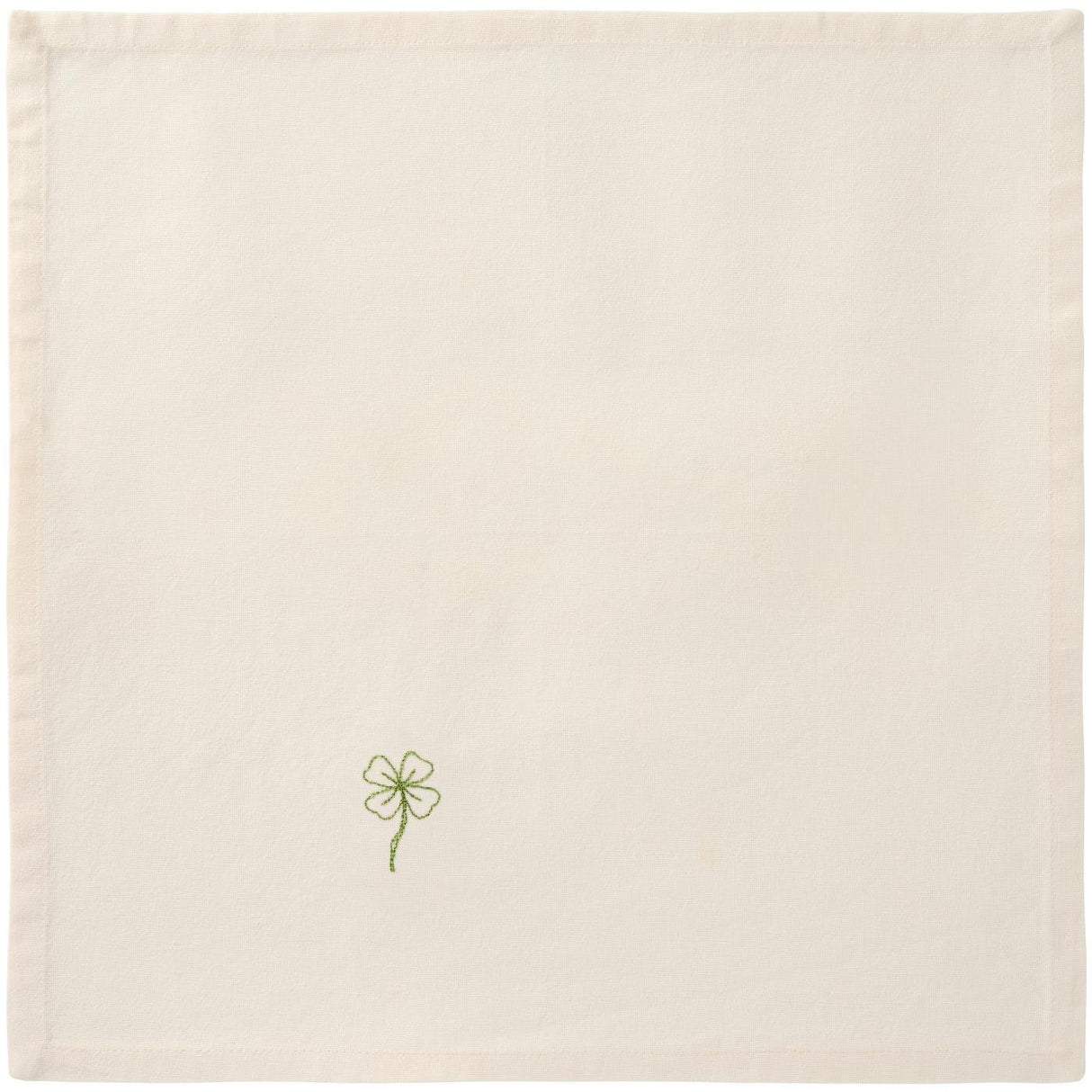 Stofserviet fra Ib Laursens Flora serie med broderet grøn firkløver på