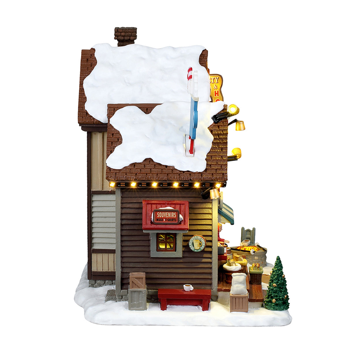 The Cocoa Shanty hus med lys til juleby fra Lemax set fra siden med lille bænk