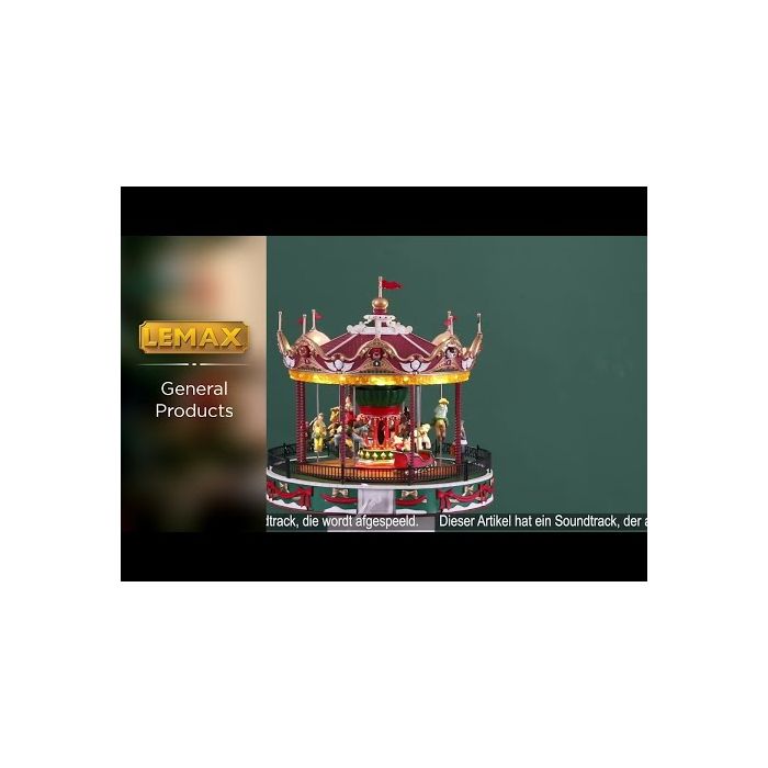 der kører rundt i karrusellen mens forældre ser på fra Lemax.