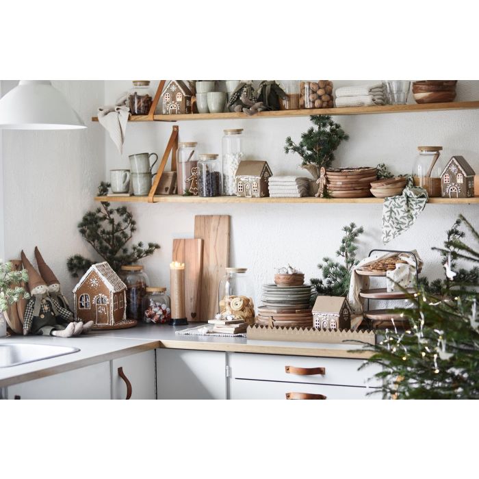 Honningkagehus til fyrfadslys med snefnug