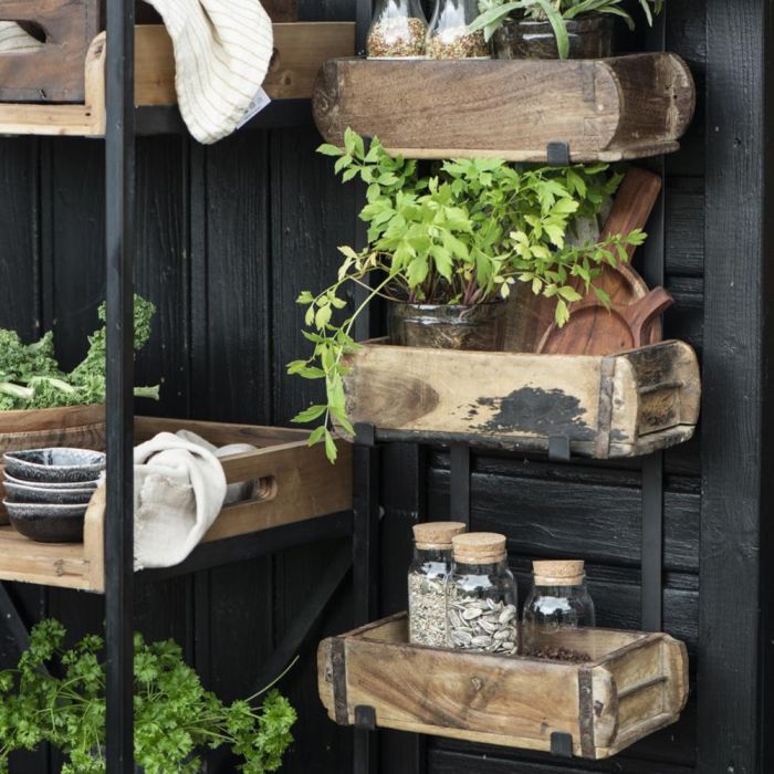 Murstensform Unika et rum fra Ib Laursen i anvendelse som opbevaring til planter og frø