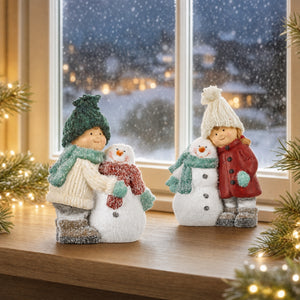 Vinterbarn med snögubbe