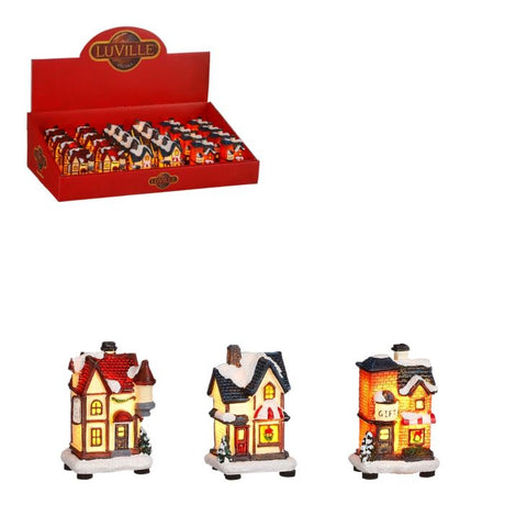 Lille julehus med lys i 