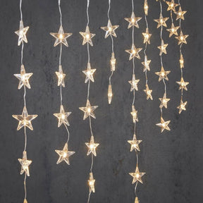 Lysgardin med stjerner