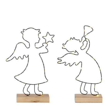 To engle i sort silhuet med lyswire på træ fod. Den ene engel holder en stjerne, den anden spiller i en trompet, fra House of Seasons. 