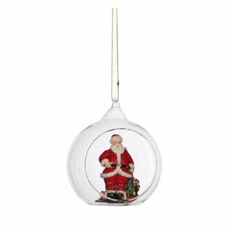 Jultomten i en glaskula för upphängning