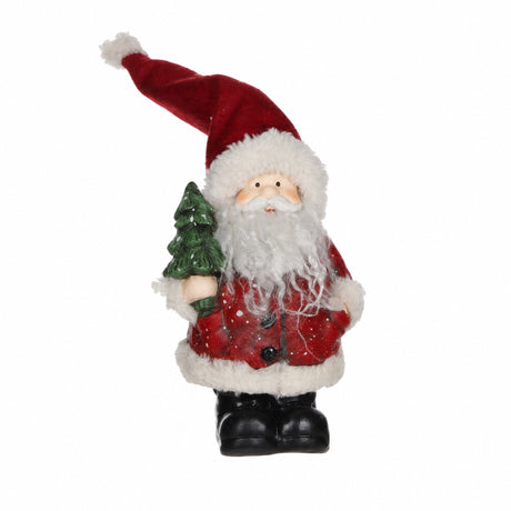 Jultomte med julgran eller lykta
