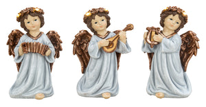 Engel med led-lys og musikinstrument 22 cm høj i polyresin