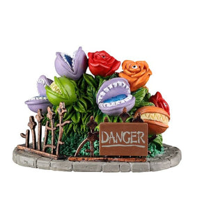Fearsome Flowers dekorationssæt med kødædende planter og "DANGER" skilt