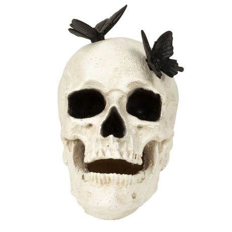 Kranium med sorte sommerfugle
