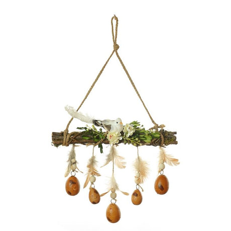 Påskedekoration med fjer og æg
