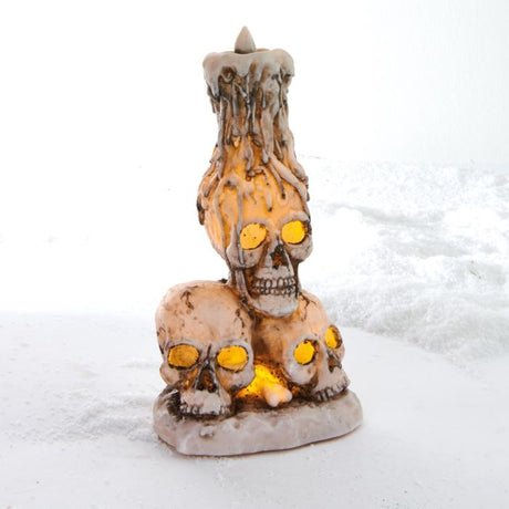 Kraniumlysestage med lys