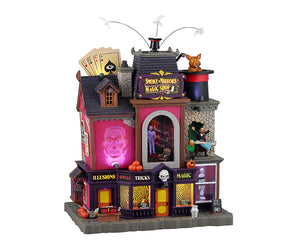 Smoke & Mirrors Magic Shop hus med lyseffekter til Halloween pynt
