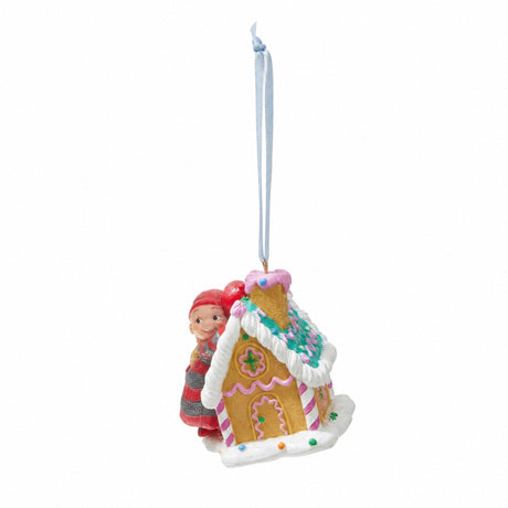 Bäbistomte i pepparkakshus 