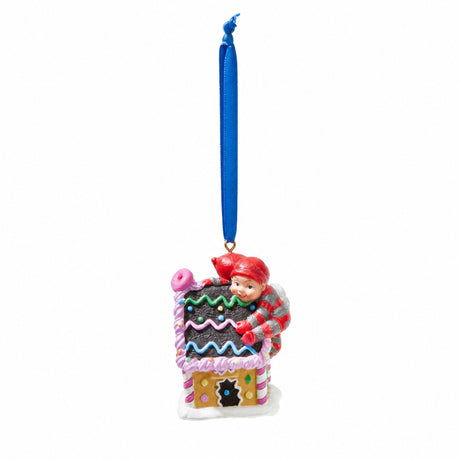 Bäbistomte i pepparkakshus 