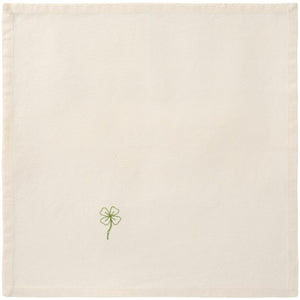 Stofserviet fra Ib Laursens Flora serie med broderet grøn firkløver på