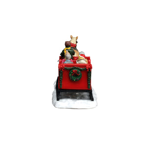 Caroling Sleigh Ride fra Lemax til juleby set bagfra
