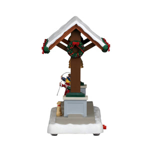 Christmas Bells Are Ringing figur til juleby fra Lemax set fra siden af