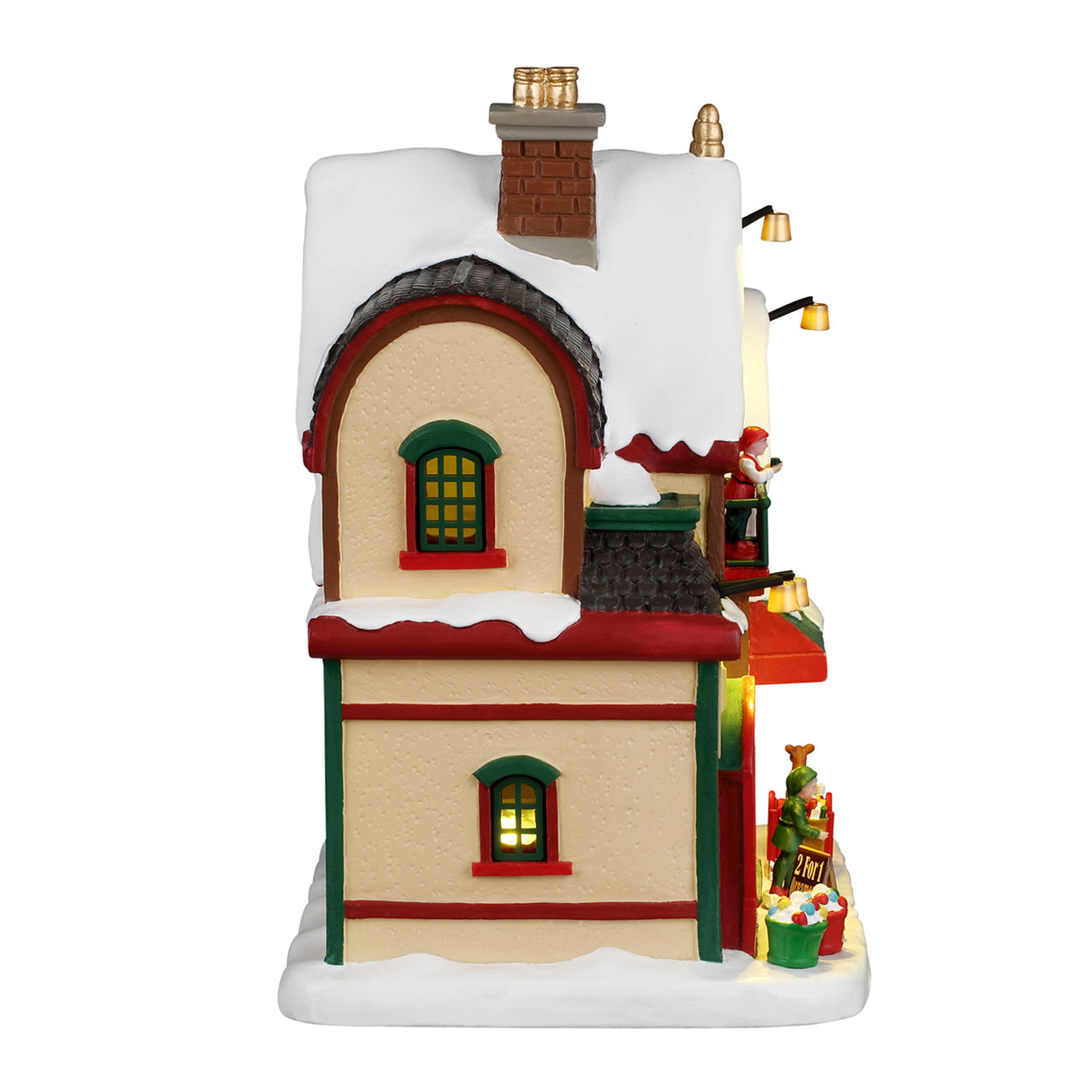 North Pole Christmas Supply hus med lys fra Lemax til juleby set fra siden med kvist med vindue