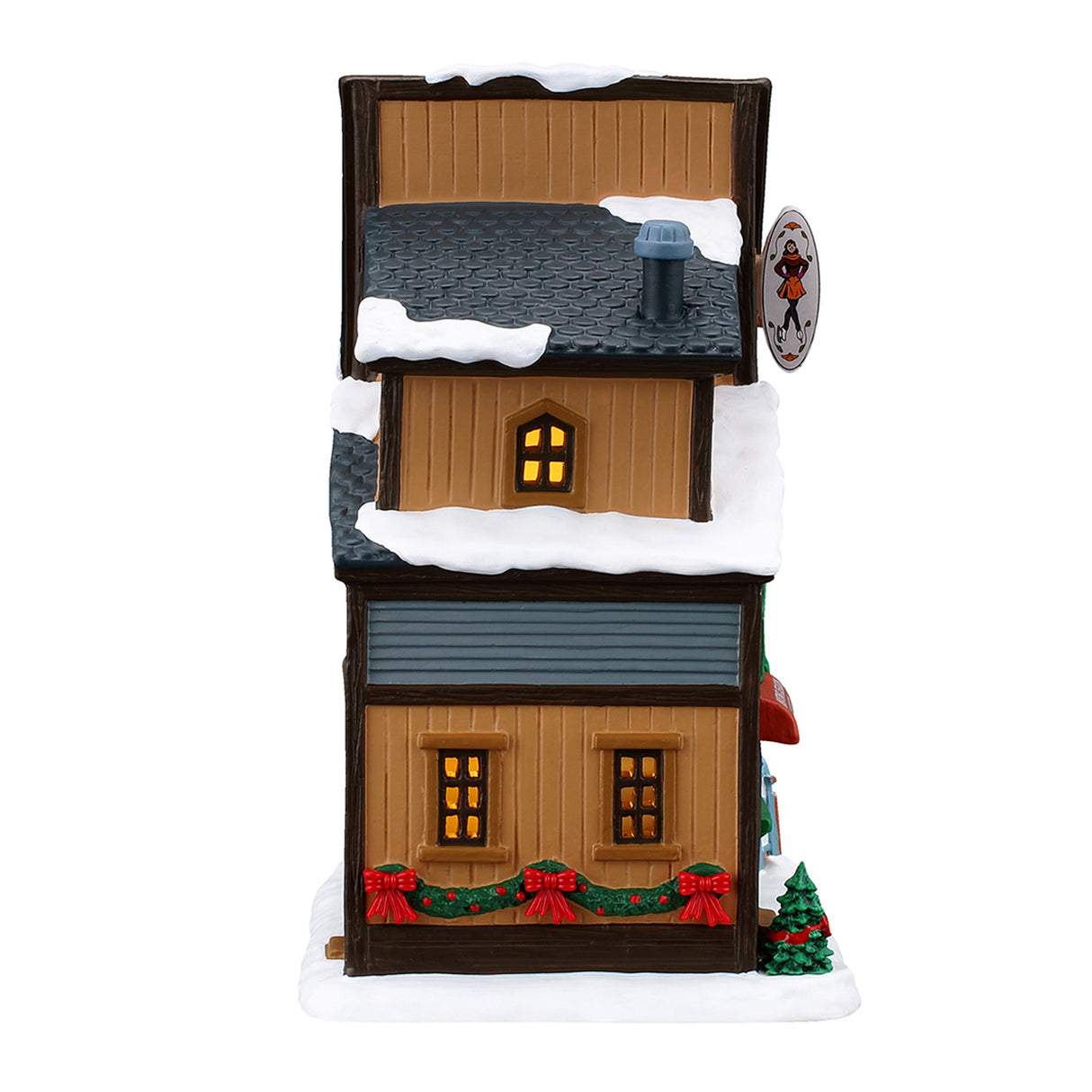 Wally's Winter Skate Shop hus med lys til juleby fra Lemax set fra siden med røde sløjfer
