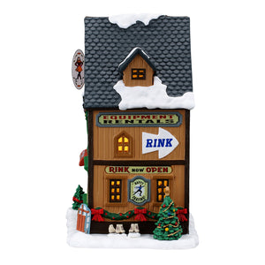 Wally's Winter Skate Shop hus med lys til juleby fra Lemax set fra siden med slkøjter