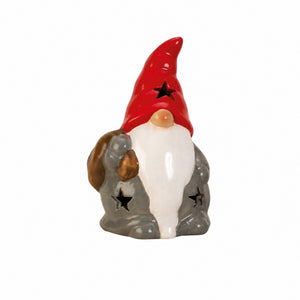 Tomtenisse i keramik med säck eller käpp
