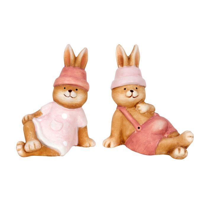 Påskehare med lyserødt tøj liggende