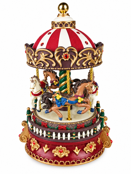 Nostalgisk karusell med musik från Musicboxworld med fyra dekorerade hästar, rött och vitt tak, gyllene ornament och glittrande röda stenar