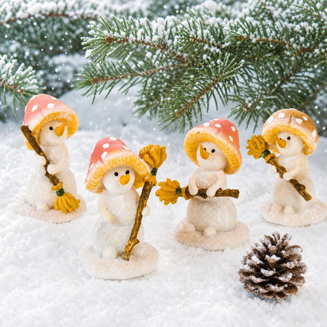 Snögubbe med kvast och svamphatt