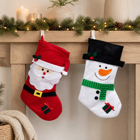 Julstrumpa med jultomte eller snögubbe