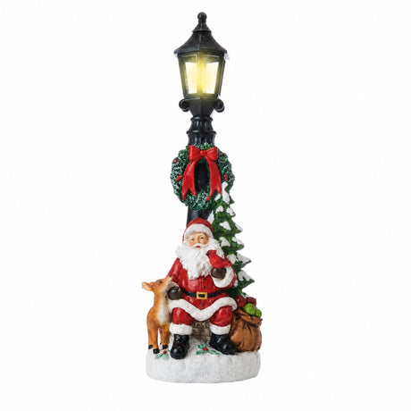 Jultomte vid lyktstolpen