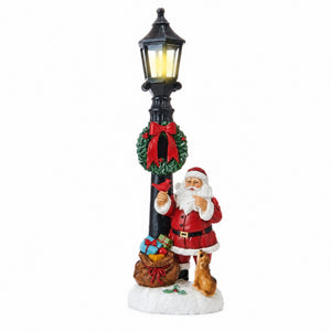 Jultomte vid lyktstolpen