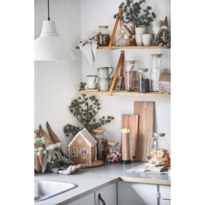 Honningkagehus til fyrfadslys med snefnug