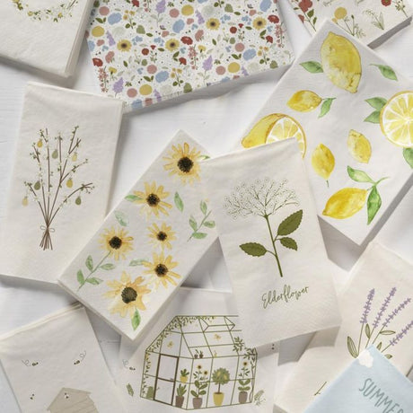 Ib Laursen papirservietter med solsikker blandt andre servietter fra samme producent