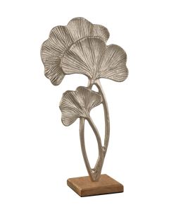 Skulptur med tropiska blad i silverfärgad